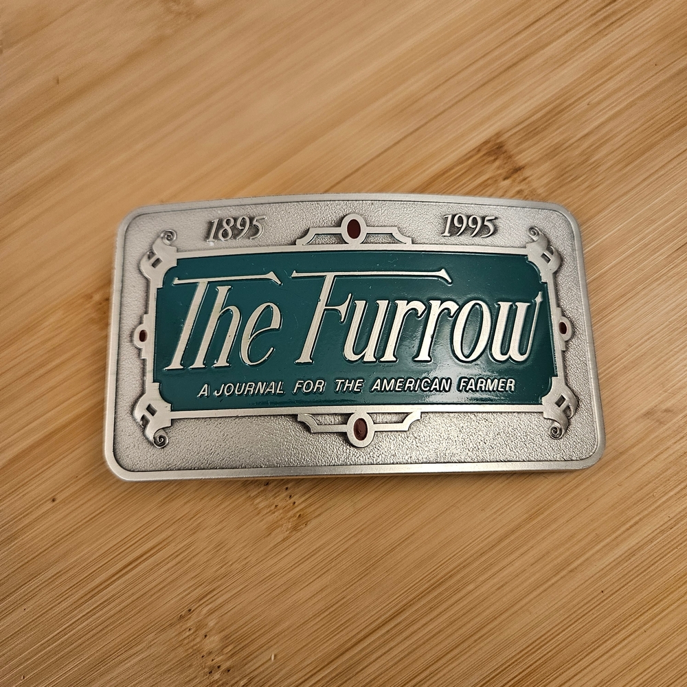 John Deere The Furrow Pewter Belt Buckle 1995 100th Anniversary Farmer Journal